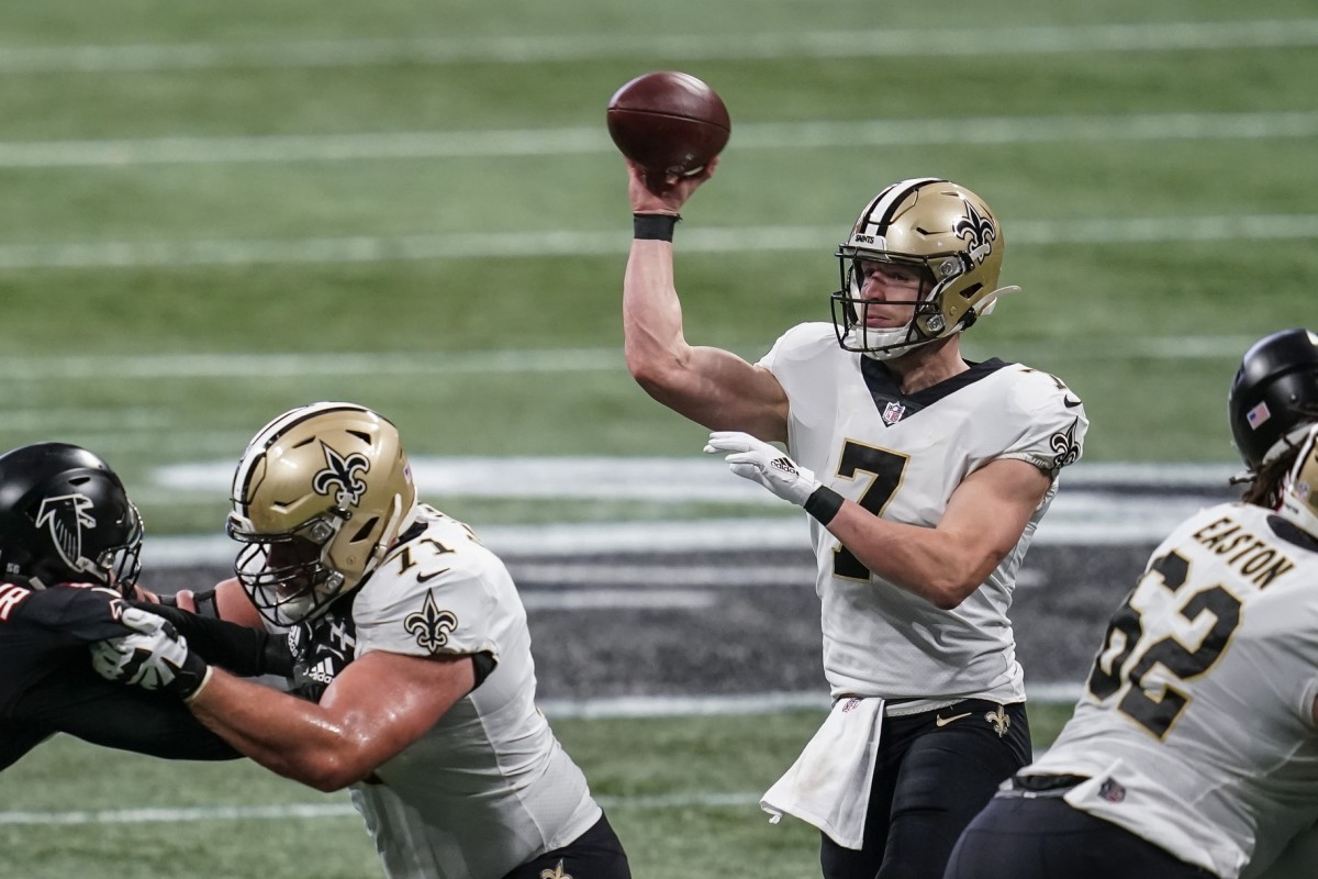 Dec 6, 2020; Atlanta, Georgia, USA; Saints quarterback Taysom Hill (7) passes against the Falcons. Mandatory Credit: Dale Zanine-USA TODAY 